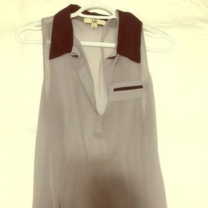 Sleeveless grey and blue blouse